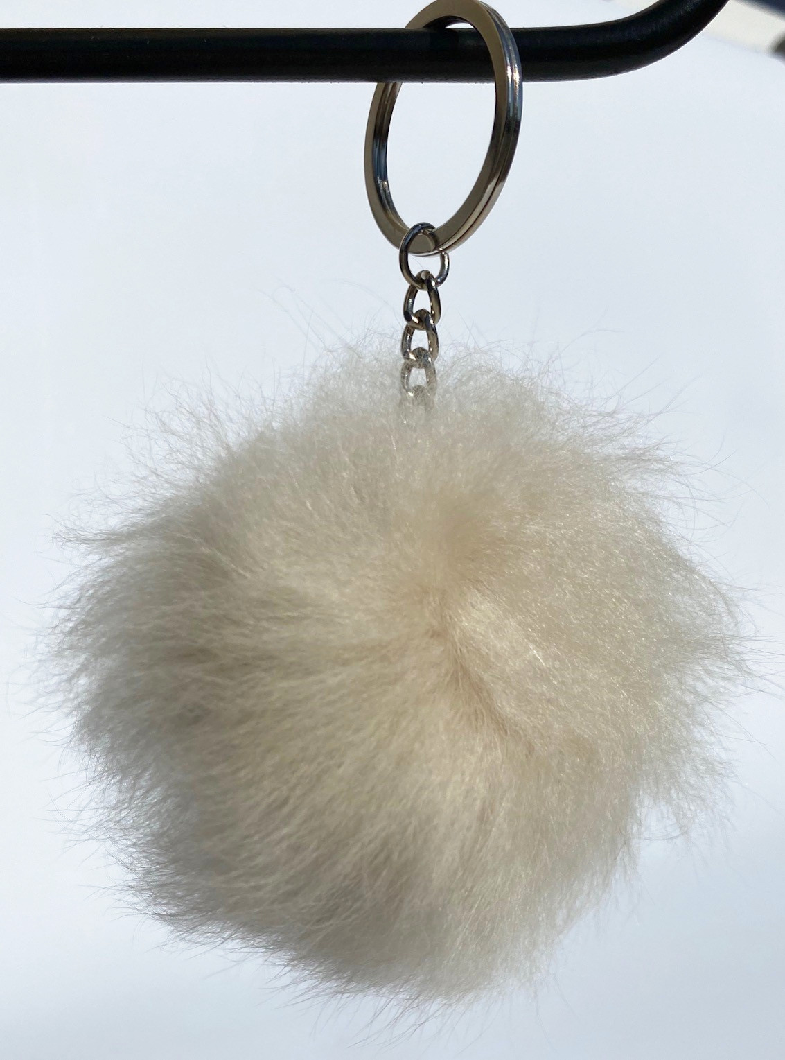 Schlüsselanhänger mit Fellbommel
